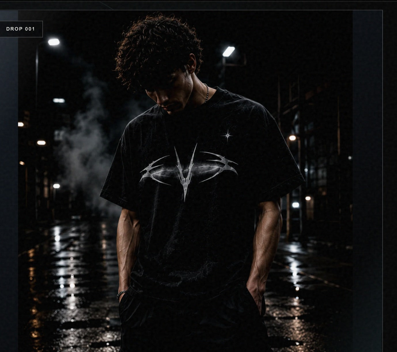 Model wearing the Velor Star Tee in a dark city campaign